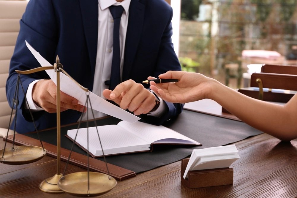 A client and their medical malpractice lawyer in Chicago collaborate on filing a medical malpractice claim, seeking justice and accountability