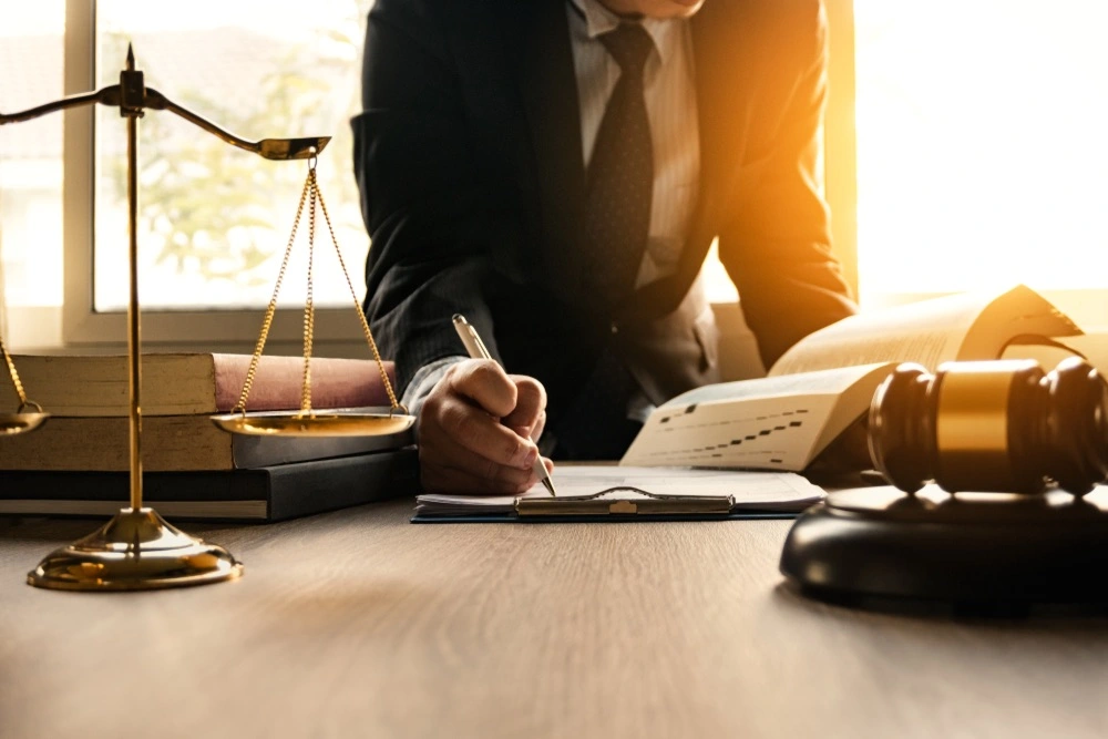 A medical malpractice lawyer in Texas intently reviews a case, emphasizing the critical need to choose the right attorney when faced with medical malpractice